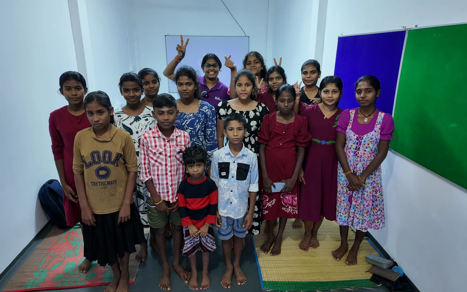 Students and a BMF team member at the Vavuniya education centre, Kanagarayankulam, Sri Lanka