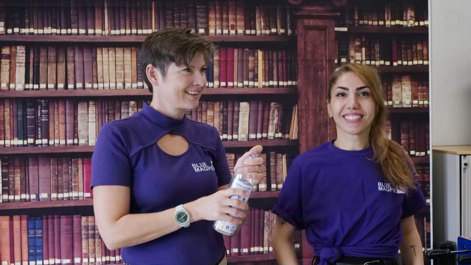 Blue Magpie Foundation mentors in purple BMF shirts in Harrow
